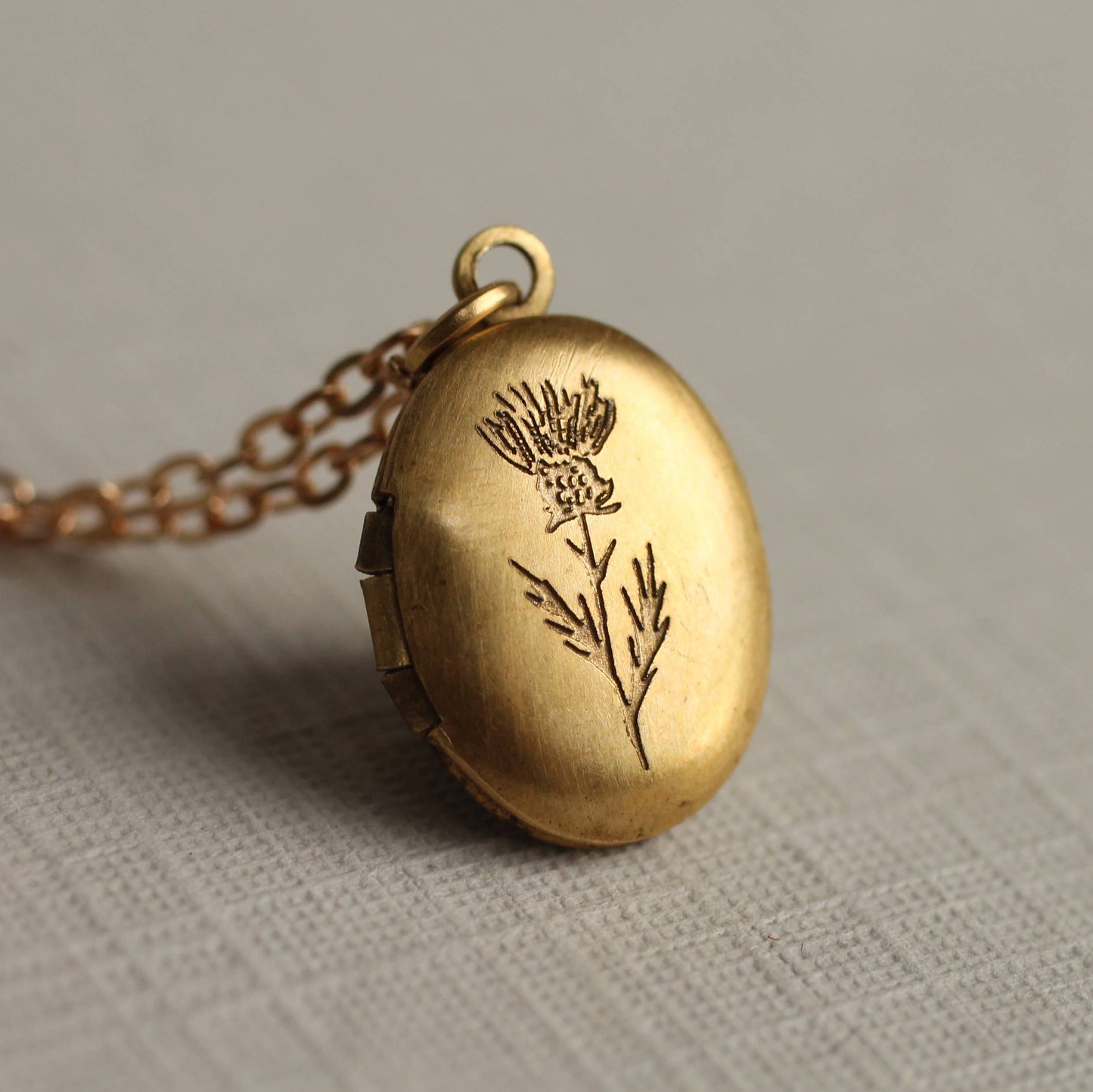 Tiny Oval Engraved Botanical Brass Locket: 20" / Standard Engraving - Thistle